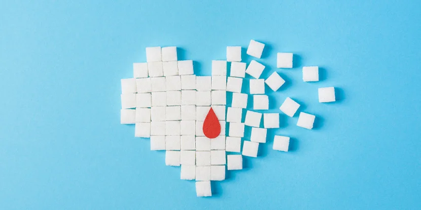 Sugar cubes arranged as a heart with a drop.