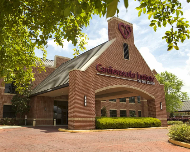 Cardiovascular institute brick building with logo.