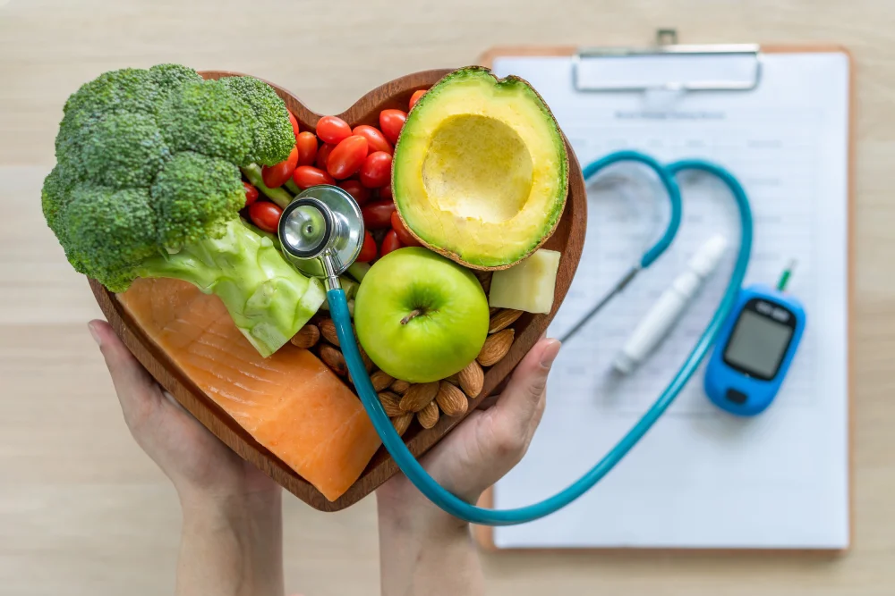 Healthy food with stethoscope and glucose meter