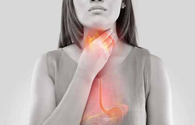 Woman with sore throat, acid reflux visualization.
